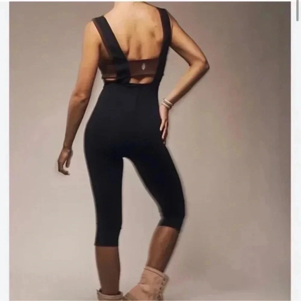 Free People Movement She’s A Maniac Jumpsuit in Red